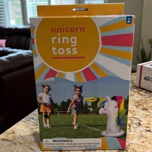 NWT unicorn ring toss inflatable. 6 toss rings included.